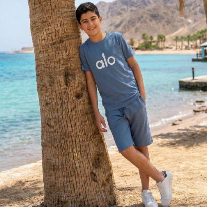 صورة طقم ولادي قطني من قطعتين.